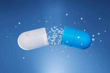 Téléchargez les photos : Une grande capsule bleue encapsule de petites particules de médicament ou d'antibiotique sur fond bleu. Concept de pharmacie, soins de santé et médecine, thérapie. Bulles flottantes fermées à l'intérieur d'une capsule. - en image libre de droit