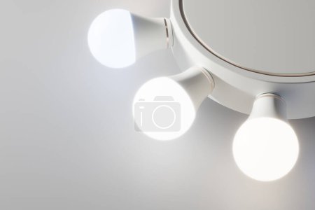 Téléchargez les photos : Un cercle moderne d'ampoules lumineuses avec une couleur de température froide dans un environnement brumeux. Les ampoules sont en verre clair et disposent d'une technologie intelligente, parfaite pour créer une ambiance d'éclairage nocturne. - en image libre de droit