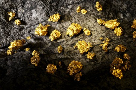 Photo for Mine wall full of gold nuggets. Hard rock surface with a visible encased precious golden grains. Gold Rush. Concept of wealth, luck, money, success, treasure, fortune and capital. - Royalty Free Image