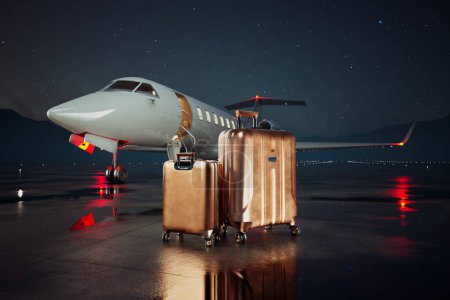 Photo for Two golden suitcases standing on a wet airstrip in front of a private jet during a starry night. Brand new, white, shiny aircraft reflects in puddles. Extremely wealthy people business travel class. - Royalty Free Image