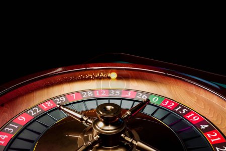 Photo for Close up shot of a spinning roulette. Presentation of a luxury casino roulette wheel with a yellow spinning fireball. Polished, elegant roulette with golden elements in Las Vegas. Gambling. Lucky game - Royalty Free Image