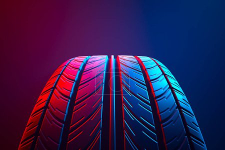 Photo for Close-up of a black rubber automotive tire with a detailed tread pattern. Perfect for concepts related to auto service, tire stores, transportation, and motorsport. - Royalty Free Image