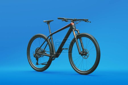 The image showcases a mountain bike in a studio setting against a blue background. A photoshoot of a bike for use in an online store. Representation of fitness, healthy lifestyle, and sports equipment