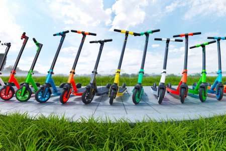 Photo for Countless colourful electric scooters standing on a sidewalk in an endless row on a clear sunny day. Blue summer sky with nice clouds and green, lush grass fields. Responsible users. - Royalty Free Image