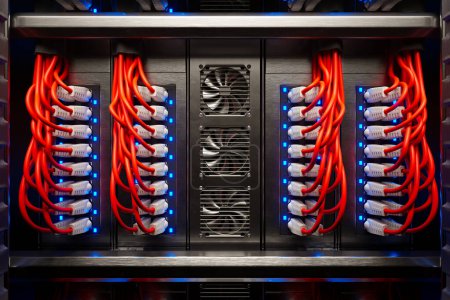 Foto de Muchos cables rojos en un moderno gabinete de la sala de servidores en una granja de renderizado oscuro iluminado por un solo foco. Cables etéreos coloridos organizados en un armario metálico. Ventiladores giratorios enfriándose. - Imagen libre de derechos