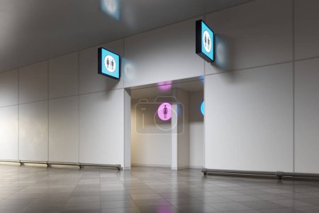 Photo for The entrance of a public restroom in an airport or train station. The glowing signs on the wall indicate the gender of the restroom. The sign is very bright and can be easily seen from a distance. WC - Royalty Free Image