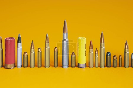 A huge row of different bullet types standing on the concrete floor. Huge variety of ammunition calibers. Handgun, carabine, automatic, shotgun, and more. Deadly combat force. Yellow background