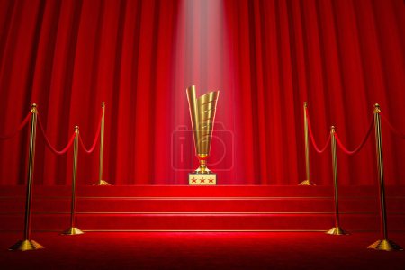 Tall, shiny, golden movie award standing in a glorious spotlight on the red carpet stairs with red velvet curtains in the background. Glamour entertainment event ceremony. Film industry event.