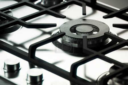Photo for Discover the perfect addition to your kitchen with this clean and modern gas cooktop. Prepare delicious meals with ease and efficiency, elevating your culinary experience - Royalty Free Image