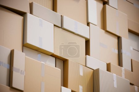 Photo for A huge pile of cardboard boxes. Stack of carton parcels. Logistic concept. Shipping business. Transportation service. Products distribution. The global reach of logistics and delivery services - Royalty Free Image
