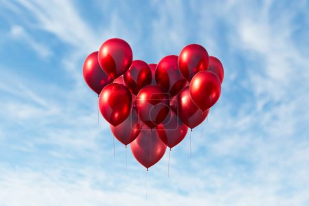 Téléchargez les photos : Les ballons rouges forment un cœur. Voler vers le haut et créer une vue envoûtante qui remplit l'air d'amour, de joie et d'excitation. Occasion ou événement spécial. Fête d'anniversaire. Anniversaire. Couple - en image libre de droit