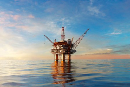 Photo for A picture of the offshore oil platform. Oil rig on the sea during the day. Industrial drilling for natural gas and oil. Exploration for natural resources used to produce energy and power. Fossil fuels - Royalty Free Image