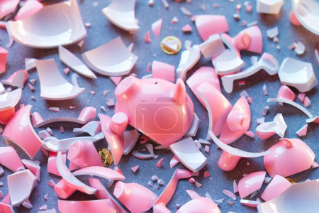 Photo for Lots of damaged piggy banks, symbolizing the devastating effects of financial loss and shattered dreams. The broken porcelain toys. No savings inside. Economical crash. Poverty. Problems. Bankruptcy - Royalty Free Image