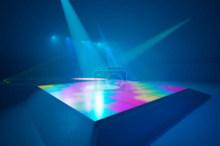 Photo for Color changing LED dance floor illuminated by disco lights. Isolated, empty dancefloor with multi-colored lights. Mirror balls, lasers, spotlights, colorful highlights for party or concert events. - Royalty Free Image