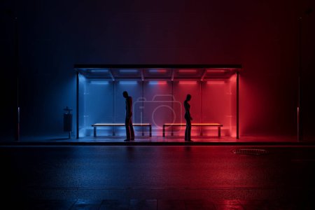 An urban scene unfolds as two individuals await transportation at a bus stop, bathed in the vibrant glow of red and blue lights against the night's backdrop.