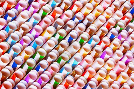 Photo for A captivating visual with a multitude of colorful, geometric straws neatly arranged, forming a vibrant and abstract pattern that can serve multiple design purposes - Royalty Free Image