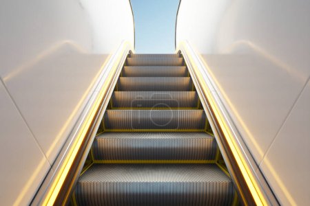 Plan symétrique esthétique d'un escalator métallique moderne dans l'environnement dynamique d'un bâtiment urbain contemporain, illustrant les prouesses architecturales et le design.