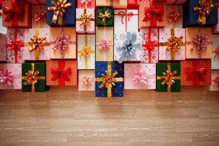 Téléchargez les photos : Cette image capture un superbe éventail de boîtes-cadeaux emballées de façon festive, vantant divers motifs et orné de rubans, judicieusement placés sur un sol en bois texturé. - en image libre de droit