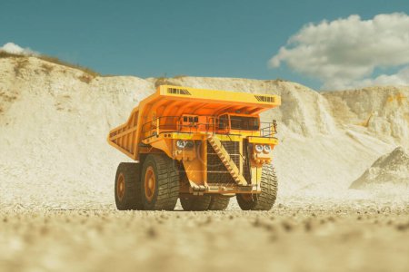 Imagen cautivadora que captura la esencia de un inmenso camión volquete naranja en acción en un bullicioso sitio minero, frente al marcado contraste de un cielo azul vivo y un terreno minero áspero.