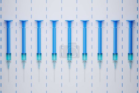 An exact, symmetric arrangement of multiple blue-plungered syringes laid out on a pure white surface, illustrating medical precision and readiness.