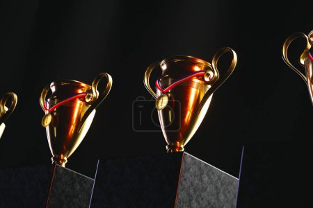 Photo for An impressive line-up of radiant golden trophies paired with first-place medals, prominently displayed against a sleek black background, symbolizing the pinnacle of competitive success. - Royalty Free Image