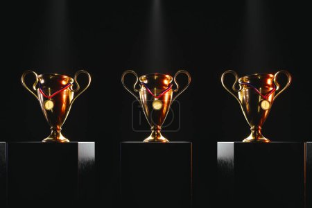 Téléchargez les photos : Un ensemble distingué de trois trophées d'or, chacun orné d'un ruban rouge vif, se dresse sous l'éclairage dramatique, incarnant le summum du succès, de la concurrence et de l'excellence. - en image libre de droit