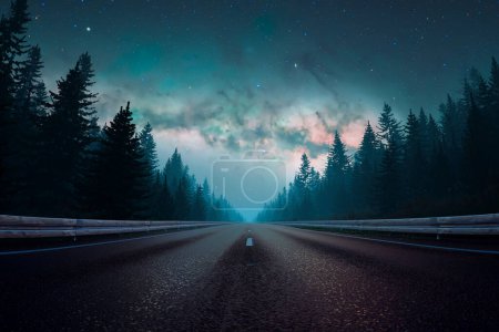Photo for A serene, deserted highway meanders through a shadowy forest under a captivating night sky teeming with twinkling stars and soft ethereal clouds. - Royalty Free Image