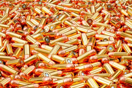 Photo for The image captures a large, scattered pile of gleaming brass bullet casings, symbolizing themes of ammunition, military preparedness, and firearm usage. - Royalty Free Image