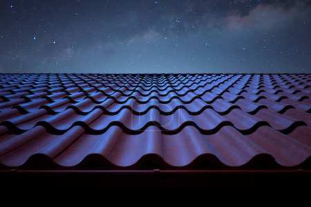 Photo for Captivating view of neatly arranged terracotta roof tiles beneath the vast, star-dotted nocturnal heavens, portraying the essence of architectural beauty meeting the natural cosmos. - Royalty Free Image