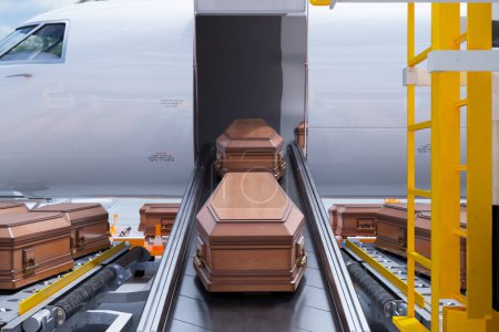 Seemingly endless line of somber wooden coffins on a conveyor belt within the cargo area of a bustling airport, meticulously ready for air transport.