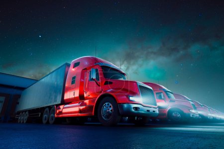 Photo for A striking scene under the stars as a convoy of red semi trucks rests at a highway stop, showcasing the dynamic world of commercial long-haul trucking after dusk. - Royalty Free Image