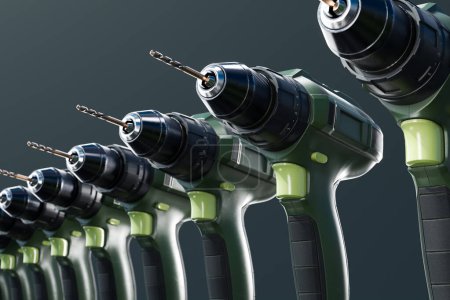 Display of multiple green and black battery-operated cordless drills, with attached bits, showcased against a dark, textured grey background, highlighting the sleek design and functionality.