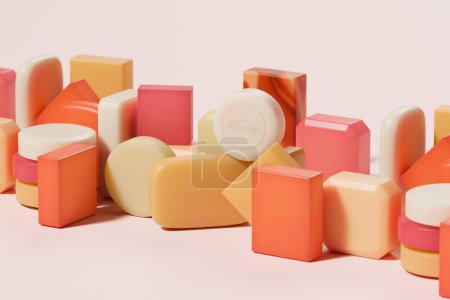 Foto de Una atractiva selección de coloridas barras de jabón hechas a mano artísticamente dispuestas, mostrando sus formas y tonos únicos sobre un fondo rosa suave. - Imagen libre de derechos