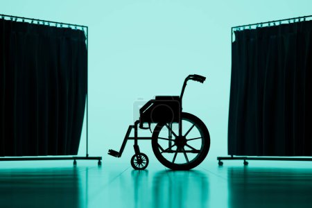 Foto de Una silueta evocadora de una silla de ruedas vacía sobre un tranquilo telón de fondo azul, destacando temas de accesibilidad, independencia y los matices de los impedimentos de movilidad. - Imagen libre de derechos