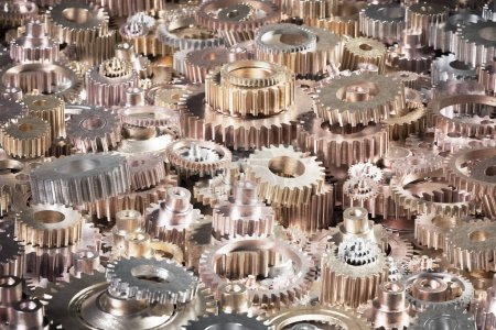 Affichage complexe d'engrenages et d'engrenages métalliques variés étroitement liés, mettant en valeur l'essence de la construction mécanique et la complexité de la conception des machines.