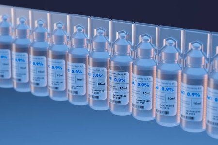 Una serie de viales de solución de cloruro sódico para inyecciones médicas, alineados ordenadamente con una cautivadora retroiluminación azul, haciendo hincapié en los suministros farmacéuticos esenciales.