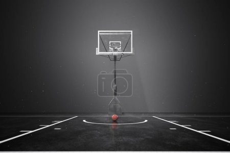 Photo for This black and white photograph captures the essence of a deserted indoor basketball court at night, with a solitary ball lying on the glossy hardwood and the hoop lit by a stark spotlight above. - Royalty Free Image