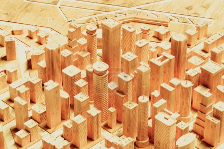 Téléchargez les photos : Exquise maquette en bois d'un horizon urbain, avec une représentation détaillée des immeubles de grande hauteur, des rues de la ville et des éléments architecturaux dans un présentoir sur table. - en image libre de droit