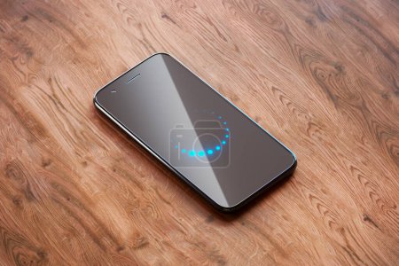 Un smartphone moderne est présenté avec sa fonction d'assistant vocal activée, indiquée par une interface bleue animée et rayonnante. Reposé sur un bureau en bois, l'appareil illustre l'interaction de pointe.