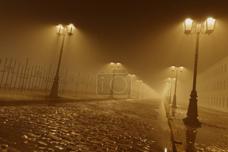 Evocative nighttime scene depicts a deserted cobbled alley bathed in the ambient golden glow of antique street lamps, with dense fog adding a layer of mystery.