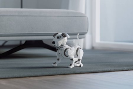 Foto de Un perro robótico de diseño intrincado con un elegante exterior blanco y gris se mueve alrededor de una sala de estar contemporánea, disfrutando del cálido resplandor de la luz natural del sol. - Imagen libre de derechos