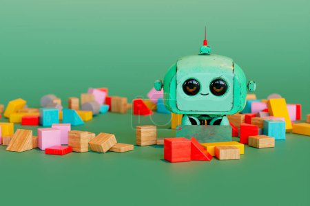 Foto de Un encantador juguete robot retro con ojos expresivos ubicado en medio de una miríada de bloques de madera vibrantes sobre un exuberante telón de fondo verde, que evoca una sensación de nostalgia. - Imagen libre de derechos