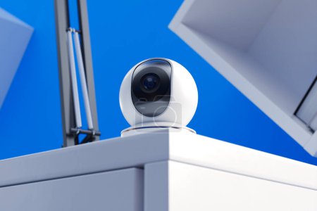 Top-notch security camera technology epitomized by a dome surveillance camera affixed to a building's exterior wall, showcased against a clear blue sky backdrop.