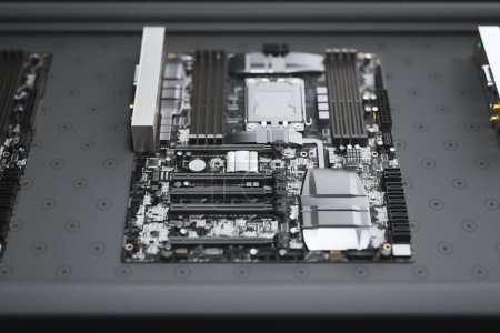 Macro capture of a cutting-edge motherboard with striking details, showcasing circuits, chipsets, and slots indicative of high-level modern computing capabilities.