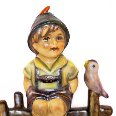  Figura de Goebel Hummel Porcelana de pastor sentado en la valla. Foto de alta calidad
