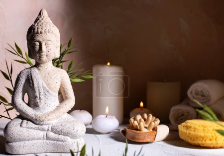 Photo for Spa beauty wellness concept with statue of Buddha with burning candles for spa time.  Religion concept. - Royalty Free Image
