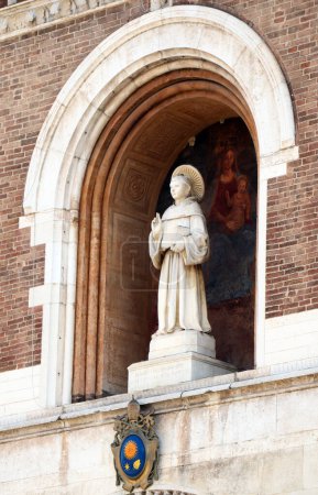 Photo for Padova - Italy - August 8, 2022: Statue of Saint Anthony in the facade of the Basilica. Padua, Italy - Royalty Free Image