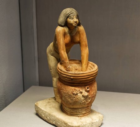 Photo for Cairo, Egypt - March 18, 2023: Statuette of a woman brewing beer. The Egyptian Museum in Cairo. - Royalty Free Image