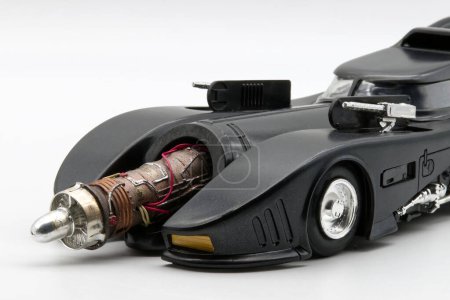 Photo for Bologna - Italy - October 31, 2023: Batmobile plastic model replica from 1989 Batman Movie. Engine exposed - Royalty Free Image
