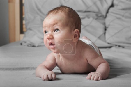 Photo for Newborn 1 month holding head. Close up portrait of infant baby. - Royalty Free Image